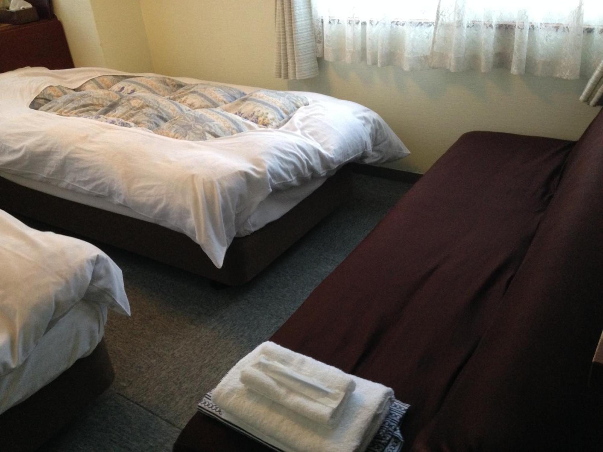 Community House Tyrolien Hotel Хакуба Стая снимка